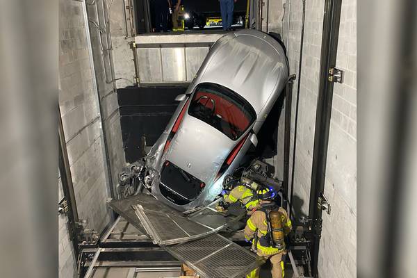 Photos: Elevator malfunction at Ferrari dealership leaves car hanging