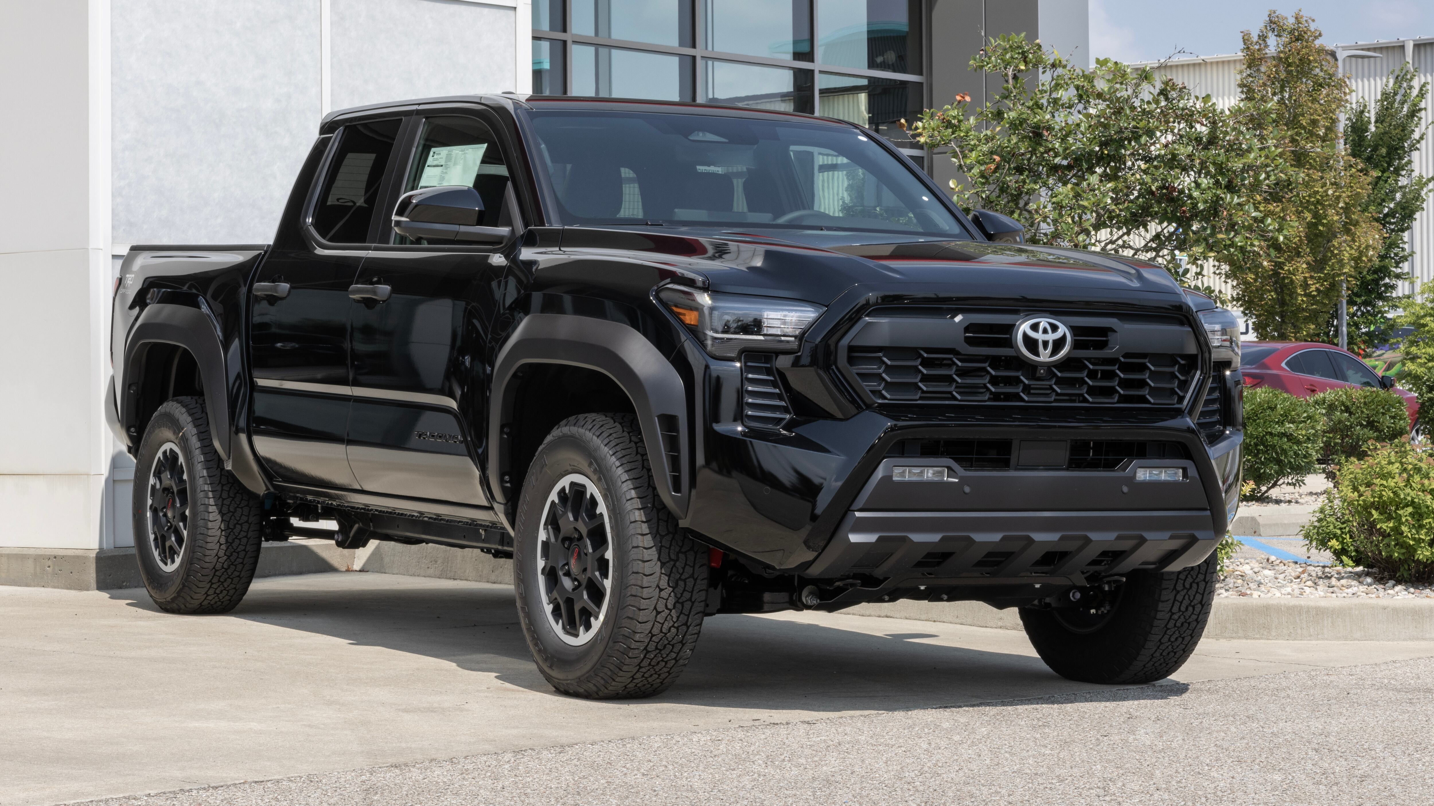 Toyota Tacoma TRD Offroad Pickup display. Toyota offers the Tacoma with a 2.4L Turbo iForce 4-Cylinder engine. MY:2024
