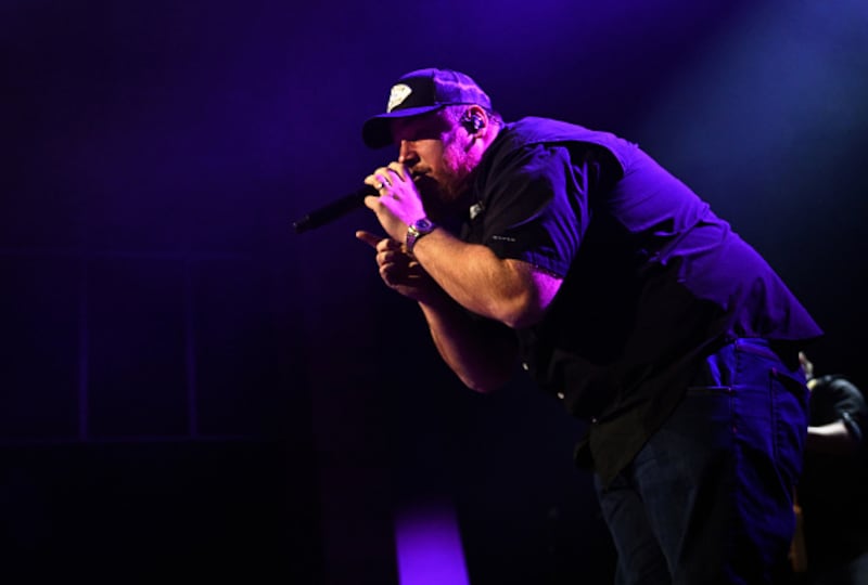 Luke Combs performing on stage