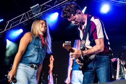 Check out these photos of Lainey Wilson, Dustin Lynch, Big & Rich, and many more from Friday at Country Concert '24 in Fort Loramie, Ohio