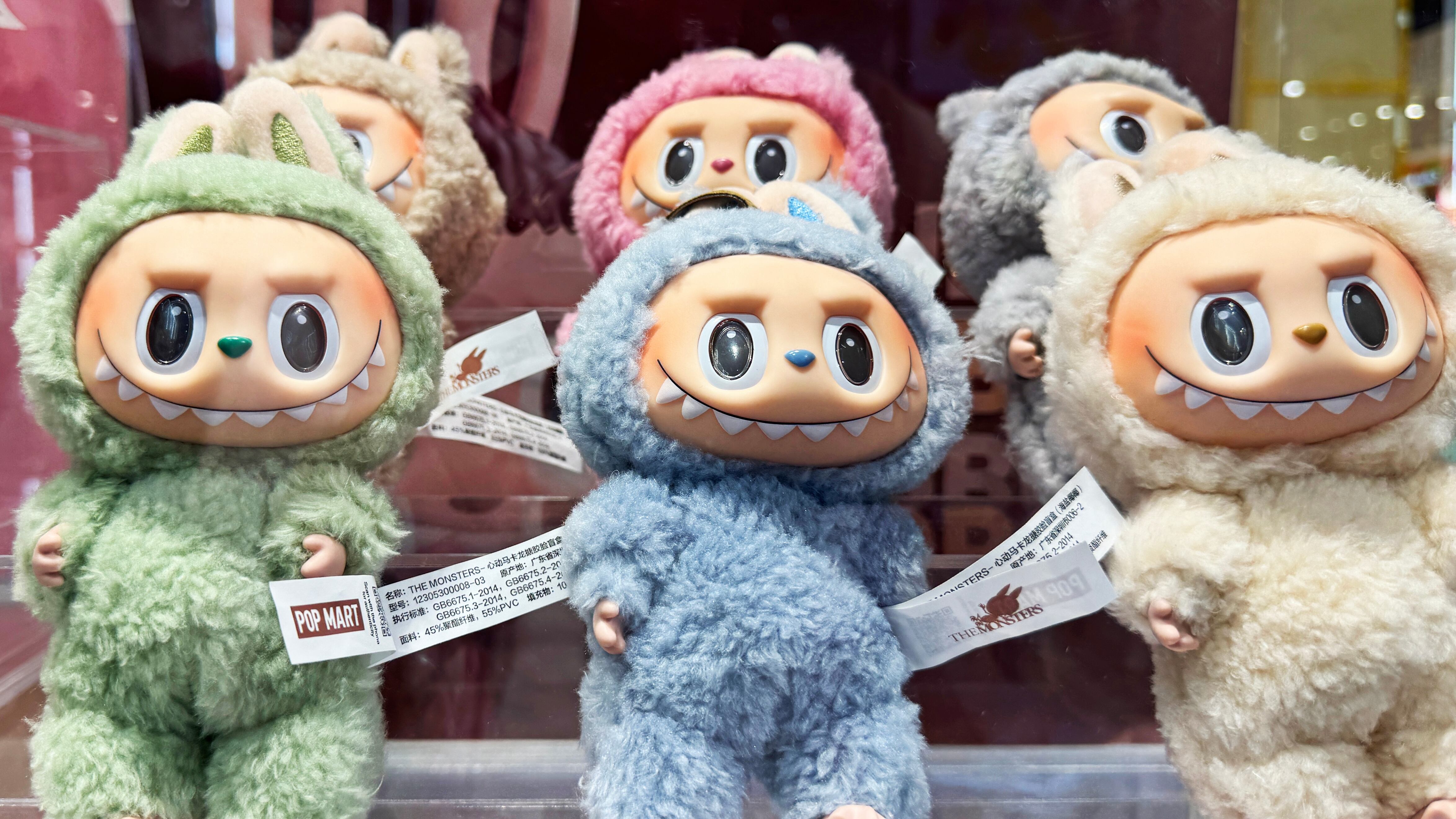 Shelf of Labubu toys