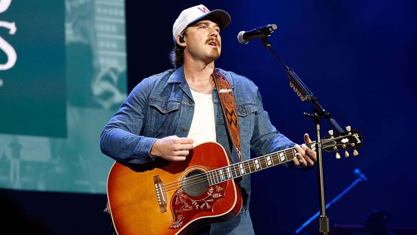 Morgan Wallen performs on stage.